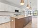 Bright kitchen featuring an island, pendant lighting, stainless steel appliances, and ample counter space at 722 Falling Oak Aly # 20, Huntersville, NC 28078