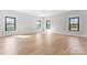 Spacious living room with natural light and stylish flooring, perfect for entertaining at 722 Falling Oak Aly # 20, Huntersville, NC 28078