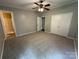 Spacious bedroom with neutral carpet, ample closet space, and access to the en-suite bathroom at 8000 Tiburon Cir, Charlotte, NC 28215