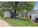 Large backyard featuring a play set, trampoline, and mature tree at 878 Cold Springs Rd, Concord, NC 28025