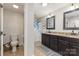 Bright bathroom with double vanity, granite counters, and modern fixtures at 878 Cold Springs Rd, Concord, NC 28025