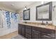 Bathroom featuring double vanity with granite countertop and shower at 878 Cold Springs Rd, Concord, NC 28025