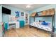 Spacious bedroom with hardwood floors, a vanity area, and a playful accent wall at 878 Cold Springs Rd, Concord, NC 28025