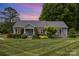 Charming home with well-maintained lawn, mature trees and established landscaping at 878 Cold Springs Rd, Concord, NC 28025