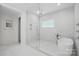 Luxurious bathroom with a walk-in shower and an elegant stand-alone bathtub at 9305 Valley Rd, Charlotte, NC 28270