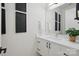 Modern bathroom boasts sleek vanity, decorative mirrors, and clean contemporary design at 9305 Valley Rd, Charlotte, NC 28270