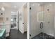 Modern bathroom with glass shower, sleek fixtures, and stylish tile flooring at 9305 Valley Rd, Charlotte, NC 28270