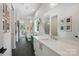 A bright, modern bathroom featuring dual vanities, sleek finishes, and stylish decor, creating a luxurious space at 9305 Valley Rd, Charlotte, NC 28270