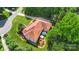 Aerial view of property showcasing the backyard, patio, mature trees, and landscaping at 1004 Berwick Ct, Waxhaw, NC 28173