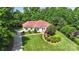 Beautiful one story home featuring well-manicured lawn, landscaping, and long driveway at 1004 Berwick Ct, Waxhaw, NC 28173