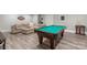 Entertainment room featuring a billiards table and a comfortable seating area, great for Gathering time at 1004 Berwick Ct, Waxhaw, NC 28173