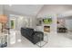 Large living room showcasing modern decor, stylish furniture, and marble fireplace at 1004 Berwick Ct, Waxhaw, NC 28173
