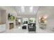 Open living room with high ceilings, marble floors, and a modern fireplace at 1004 Berwick Ct, Waxhaw, NC 28173