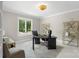 Bright home office with a large window, modern desk, and stylish shelving at 1004 Berwick Ct, Waxhaw, NC 28173
