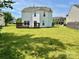 Wide backyard featuring a deck and a house in the background at 12713 Frank Wiley Ln, Charlotte, NC 28278