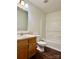Cozy bathroom featuring a single sink vanity, toilet, and tub with shower at 12713 Frank Wiley Ln, Charlotte, NC 28278