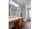 Primary bathroom featuring a long vanity, and combination shower and tub at 12713 Frank Wiley Ln, Charlotte, NC 28278