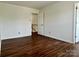 Large bedroom with neutral decor and ample space at 12713 Frank Wiley Ln, Charlotte, NC 28278
