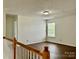 Bright, versatile bonus room bathed in natural light, ideal for an office or playroom at 12713 Frank Wiley Ln, Charlotte, NC 28278