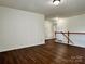 Open and inviting bonus room, perfect for entertaining or relaxing at 12713 Frank Wiley Ln, Charlotte, NC 28278
