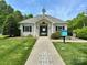 Attractive clubhouse features a hopscotch walkway, perfect for Gathering fun, nestled in a vibrant community at 12713 Frank Wiley Ln, Charlotte, NC 28278