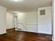 Second floor landing with railing at 12713 Frank Wiley Ln, Charlotte, NC 28278