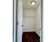 Compact walk-in closet providing efficient storage with wire shelving and easy access at 12713 Frank Wiley Ln, Charlotte, NC 28278