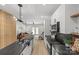 Bright open floorplan with modern kitchen overlooking the spacious living room at 1354 Briar Creek Rd, Charlotte, NC 28205