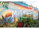Vibrant Midwood Plaza mural, showcasing a unique community landmark and drawing visitors to this lively district at 1354 Briar Creek Rd, Charlotte, NC 28205