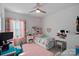 A cozy bedroom with colorful decorations and furniture, creating a comfortable and inviting space at 14004 Fiery Mist Way, Huntersville, NC 28078