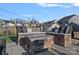 Outdoor fire pit area with seating, ideal for relaxing and enjoying the landscaped backyard at 14004 Fiery Mist Way, Huntersville, NC 28078