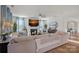 Spacious living room features a cozy fireplace, large sectional sofa, and stylish decor at 14004 Fiery Mist Way, Huntersville, NC 28078