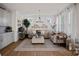 Comfortable living room with neutral tones, stylish furniture, and plenty of natural light at 14004 Fiery Mist Way, Huntersville, NC 28078