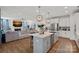 Open floor plan with a seamless transition from the kitchen to the living room for modern living at 14004 Fiery Mist Way, Huntersville, NC 28078