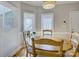 Breakfast nook with lots of natural light and bright windows to make for the perfect start to any day at 15824 Feeny Ct, Charlotte, NC 28278