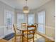 Charming breakfast nook with natural light and comfortable seating near the kitchen at 15824 Feeny Ct, Charlotte, NC 28278