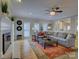 Comfortable living room featuring a large gray sectional sofa and neutral decor at 15824 Feeny Ct, Charlotte, NC 28278