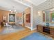 Elegant dining room with hardwood floors, designer wallpaper and plenty of natural light at 1614 Brook Rd, Charlotte, NC 28205