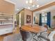 Elegant dining room with a round table, gray chairs and plenty of natural light at 1614 Brook Rd, Charlotte, NC 28205