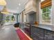 Stylish kitchen with stone countertops, an oven range, and ample natural light from large windows at 1614 Brook Rd, Charlotte, NC 28205