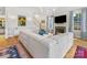 Spacious living room with a fireplace and a staircase leading to the upper level at 1614 Brook Rd, Charlotte, NC 28205