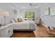 Bright bedroom with hardwood floors and lots of natural light at 21305 Sandy Cove Rd, Cornelius, NC 28031