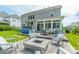 Outdoor space with a fire pit, patio furniture, and a well-maintained lawn for entertaining at 2164 Hanging Rock Rd, Fort Mill, SC 29715