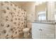 This bathroom is well-equipped, featuring a shower-tub combination and a vanity at 2164 Hanging Rock Rd, Fort Mill, SC 29715