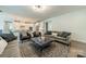 The living room features an open layout with designer furniture and a modern kitchen at 2164 Hanging Rock Rd, Fort Mill, SC 29715