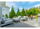 Relaxing outdoor patio with comfortable seating and a beautiful brick paver design at 2164 Hanging Rock Rd, Fort Mill, SC 29715