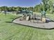 Community playground with slides, climbing structures, and a safe, cushioned ground at 2164 Hanging Rock Rd, Fort Mill, SC 29715