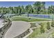 Community tennis courts surrounded by lush landscaping and greenery at 2164 Hanging Rock Rd, Fort Mill, SC 29715