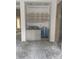 Bar area with light gray cabinetry and shelving, ready for customization and finishing touches at 3030 Brookridge Ln, Charlotte, NC 28211