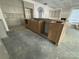 Large kitchen island with cabinetry and unfinished counters, set within an expansive kitchen area at 3030 Brookridge Ln, Charlotte, NC 28211